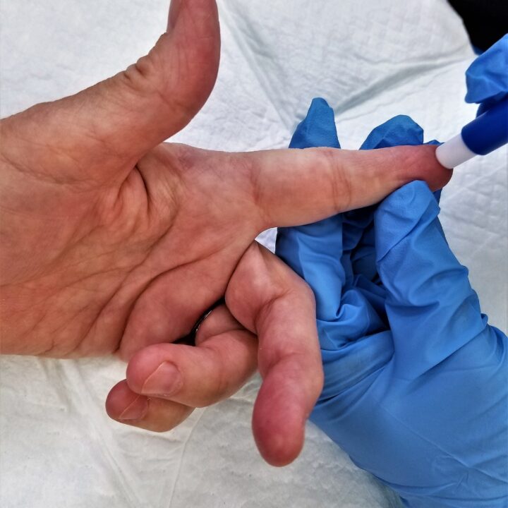 diabetes-testing-finger-prick-blood-glucose-test-2023-11-27-05-21-21-utc